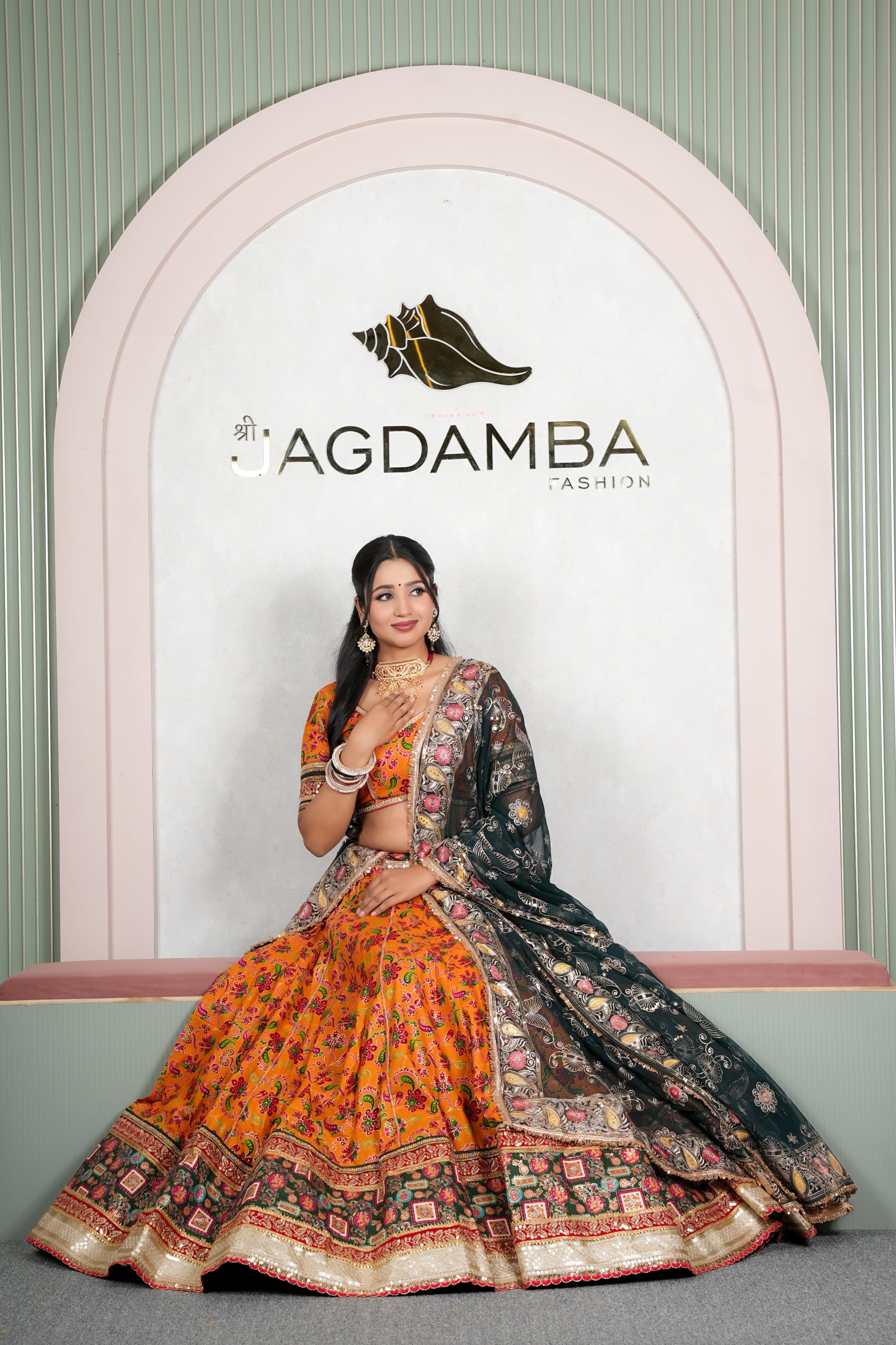 Rajasthani Orange Printed Lehenga with Dark Green Embroidered Dupatta