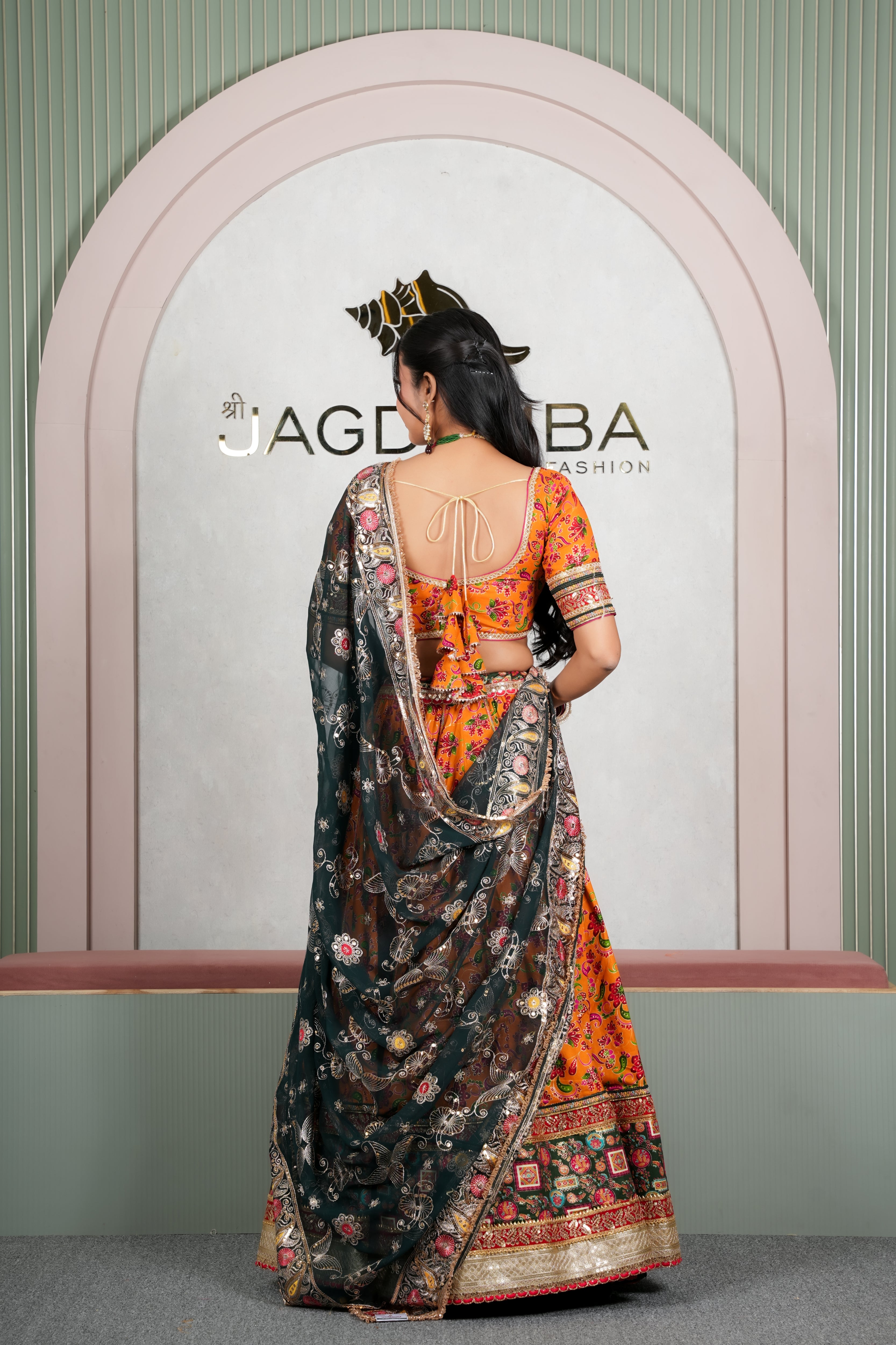 Rajasthani Orange Printed Lehenga with Dark Green Embroidered Dupatta